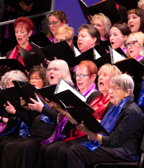 altos singing in a concert